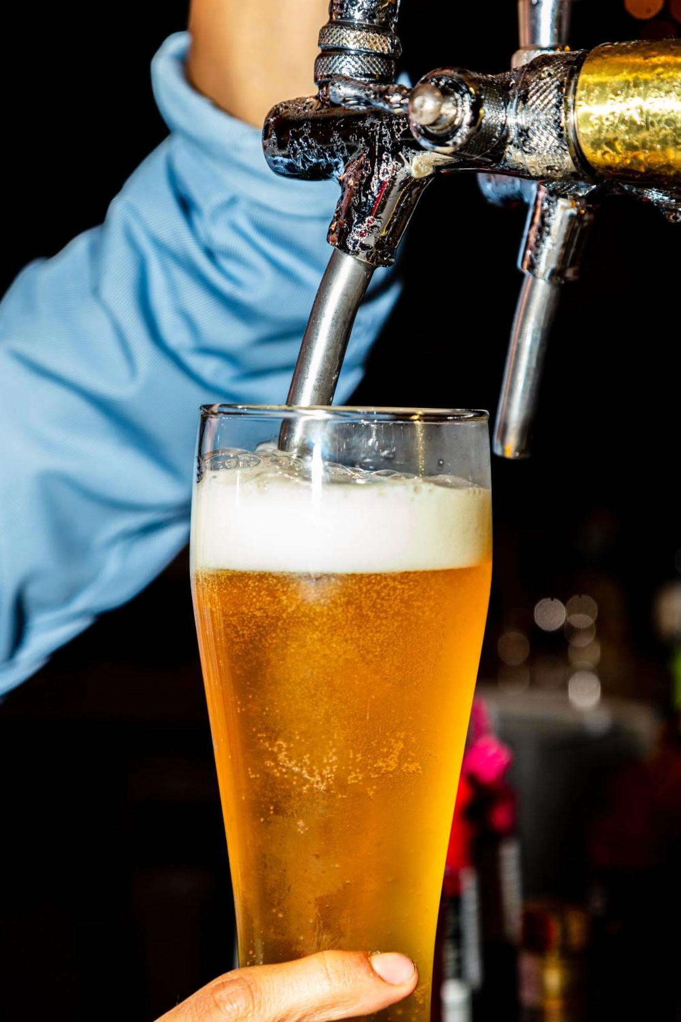 Sonesta Hotel Bogota Bagian luar foto Beer being dispensed from a tap